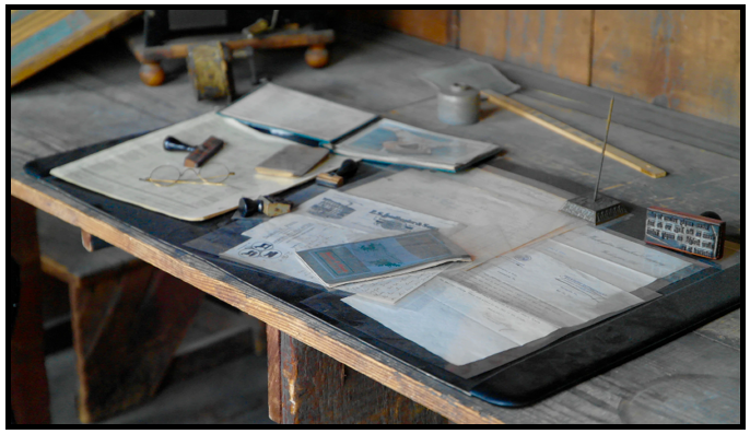 Papers laid out on a desk