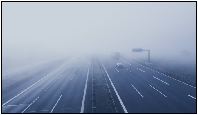 A very foggy road