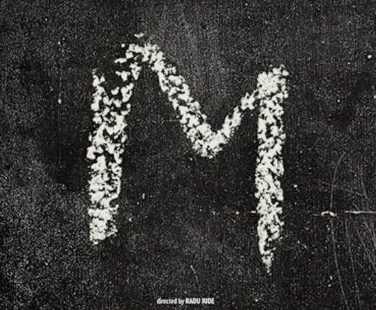 Movie poster for the film Uppercase Print. The poster shows the letter M in white against a black background.